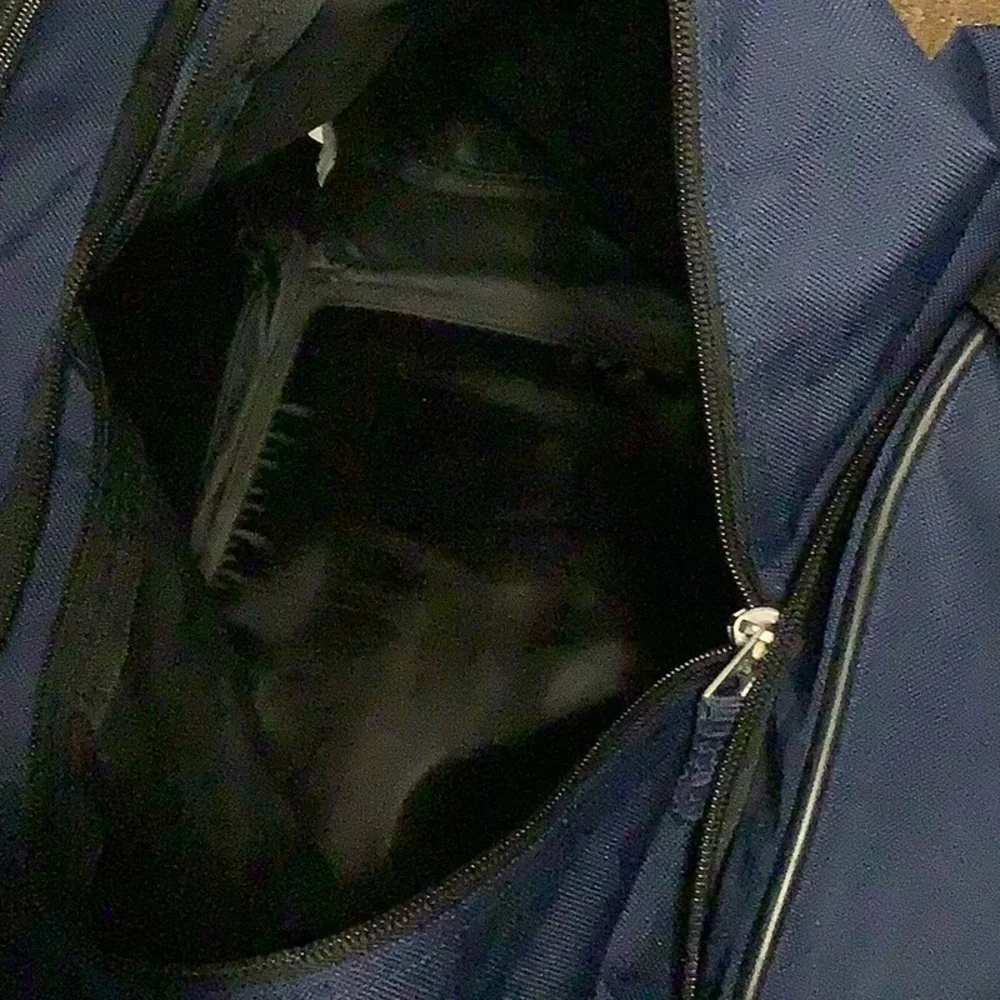 American Tourister Navy collapsible duffle bag
